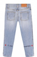 Джинсы с декоративными потертостями и вышивкой